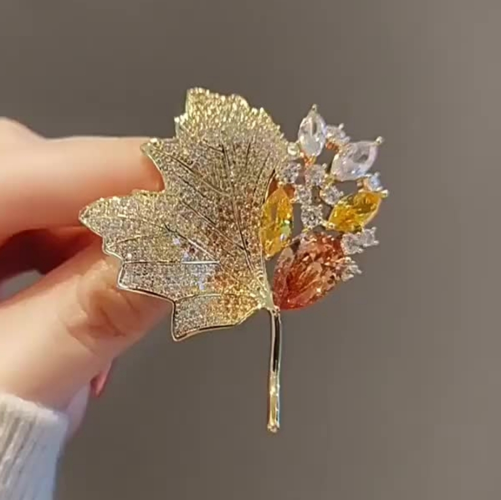 Elegant Gold Leaf Brooch with Multicolor Accents